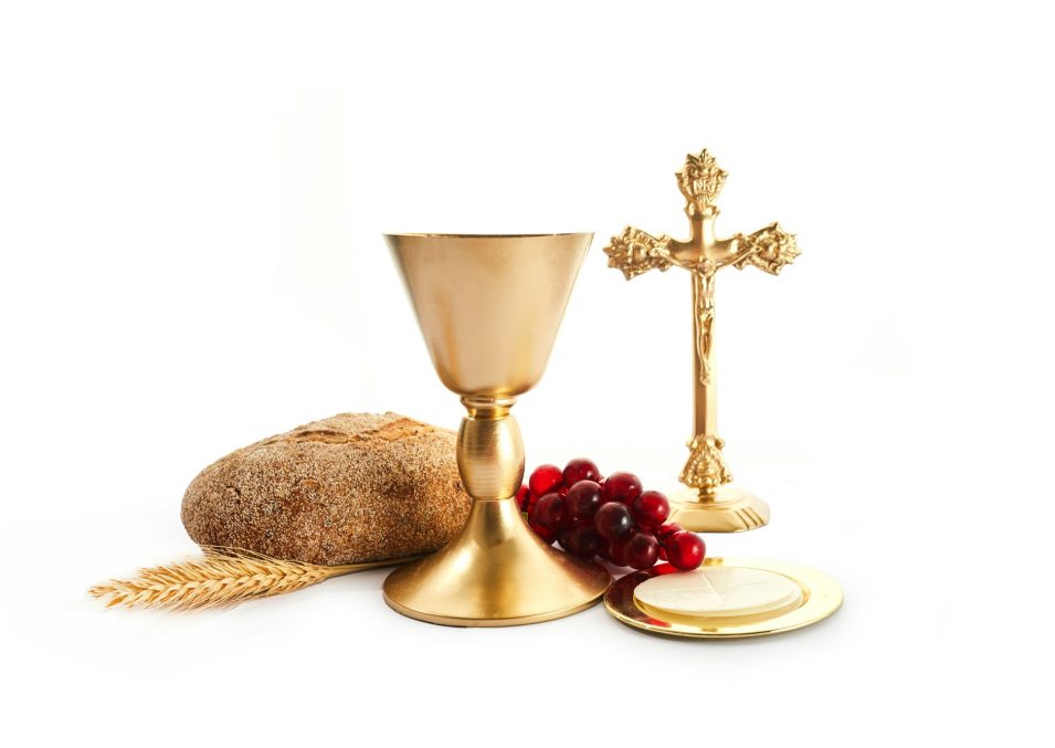 Holy Communion. A chalice of wine, bread, grapes and ears of wheat. Easter service,